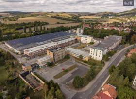 Prodej rozsáhlého areálu (sklady,výroba,administrativa), plocha budov 52.235m2, vlastní vlečka, celková výměra pozemků 113.211m2